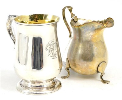 Lot 463 - George III silver half-pint mug, London 1775 and a baluster milk jug