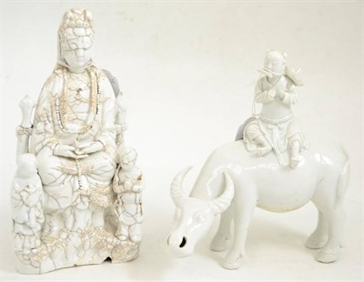 Lot 467 - Blanc de Chine figure of Guanyin and another of a boy on a buffalo (2)