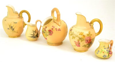 Lot 471 - Five pieces of Royal Worcester blush ivory comprising of two jugs painted with flowers, a miniature