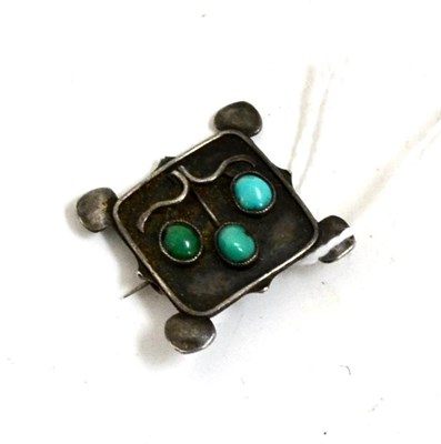 Lot 502 - Arts & Crafts brooch set with turquoise