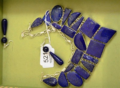 Lot 521 - A lapis lazuli type necklace and pair of drop earrings