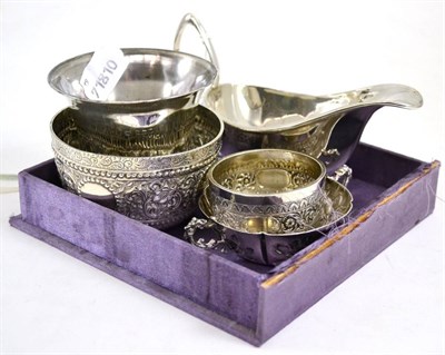 Lot 537 - A collection of small silver including a sauceboat, bonbon dish, etc