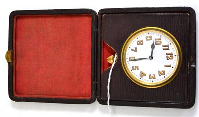 Lot 539 - A travelling timepiece, circa 1930, lever movement, enamel dial with luminous numerals, nickel...