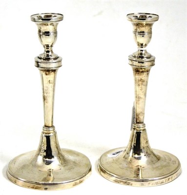 Lot 549 - A pair of 19th century silver candlesticks, stamped 'RS' and another mark, possibly French...