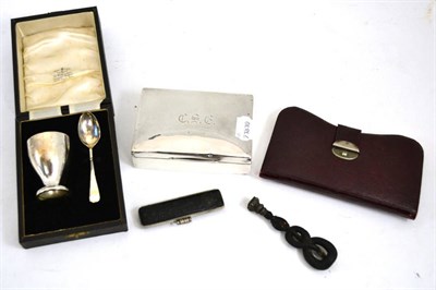 Lot 574 - A seal, a cased seal, a cigarette box and a cased silver egg cup and spoon