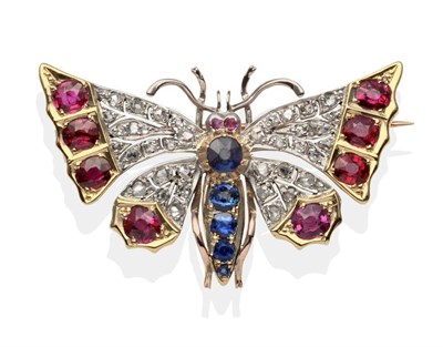 Lot 219 - A Victorian Diamond, Ruby and Sapphire Butterfly Brooch, the wings set throughout with rose cut...