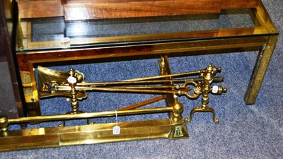 Lot 1012 - A brass fire curb, irons and dogs, copper tray on folding stand etc