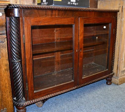 Lot 1031 - A 19th century mahogany glazed side cabinet