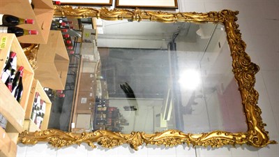 Lot 1098 - A large modern gilt framed wall mirror