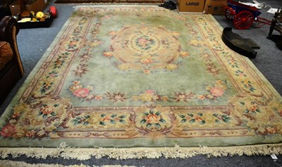 Lot 1113 - A large Chinese woollen carpet 360cm by 270cm