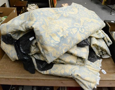 Lot 1115 - Two pairs of pale blue printed cotton curtains, lined and interlined