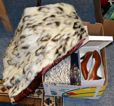 Lot 1162 - A faux fur white and brown long cape with label marked Glen Models London, six pairs of shoes...