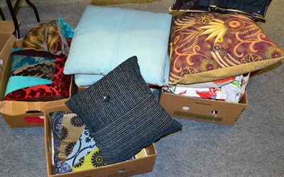 Lot 1164 - Assorted modern decorative cushions in various colours and fabrics and a large bolster cushion...