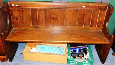 Lot 1188 - An oak pew