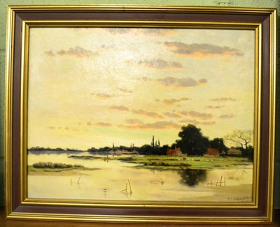 Lot 1250 - Richard Halfnight (1855-1925), An estuary scene with buildings at sunset, signed oil on board