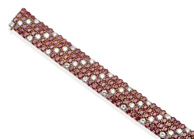 Lot 254 - A Ruby and Diamond Bracelet, four rows of round cut rubies and round brilliant cut diamonds,...