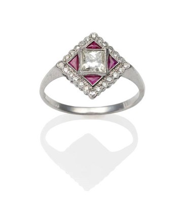 Lot 255 - An Art Deco Style Diamond and Ruby Ring, a princess cut diamond within a diamond shaped frame...