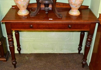 Lot 1281 - A pair mahogany single drawer side tables with pediment back