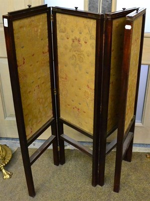 Lot 1300 - A 19th century mahogany four fold screen fabric inserts