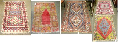 Lot 1301 - Mudjur Prayer rug, central Anatolia, the stepped raspberry field beneath a Mihrab flanked by...