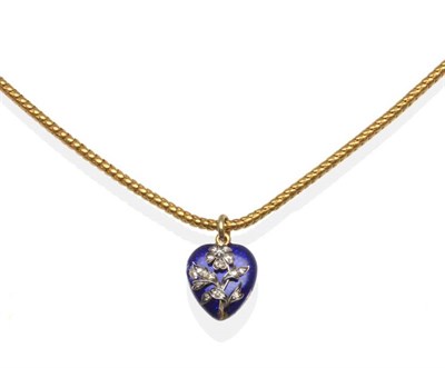 Lot 260 - A Diamond and Blue Enamel Heart Shaped Locket Pendant, overlaid with a floral motif set with...