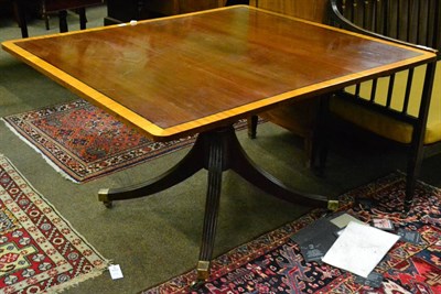 Lot 1323 - A mahogany satinwood banded and ebony strung breakfast table