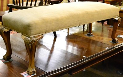 Lot 1327 - George III walnut long stool with upholstered top