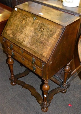 Lot 1340 - Small walnut reproduction bureau in the early Georgian style