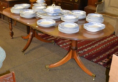 Lot 1345 - George III style mahogany twin pedestal dining table