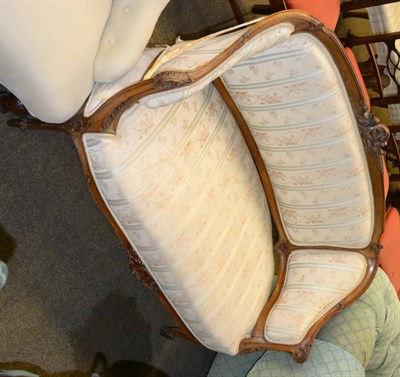 Lot 1359 - Carved French two seater settee with fabric upholstery