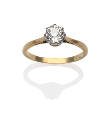 Lot 266 - A Diamond Solitaire Ring, an old cut diamond in a white claw setting, to yellow tapered...