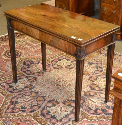 Lot 1385 - George III carved mahogany fold-over tea table