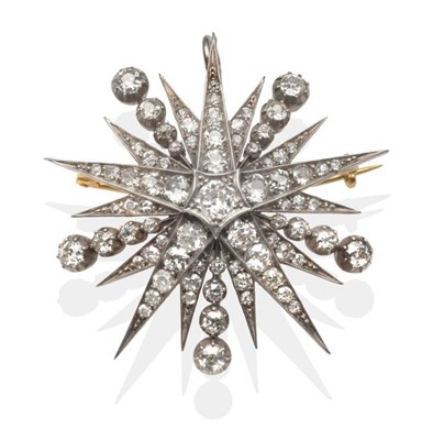Lot 269 - A Victorian Diamond Star Brooch, a central old cut diamond in a white star setting to fifteen...
