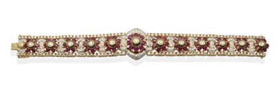 Lot 270 - A Ruby and Diamond Bracelet, a central cluster of a round brilliant cut diamond in a domed...