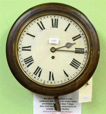 Lot 1445 - An oak veneered wall timepiece