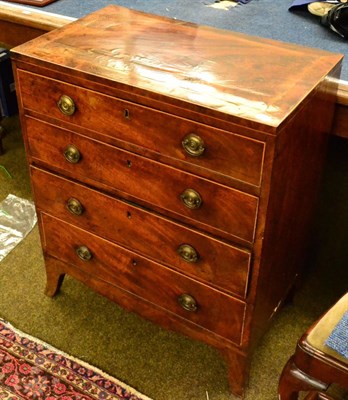 Lot 1452 - Small Regency mahogany box top chest of four long drawers, with key