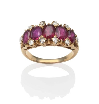 Lot 277 - A Ruby and Diamond Ring, five oval cut rubies spaced by old cut diamond accents in yellow claw...