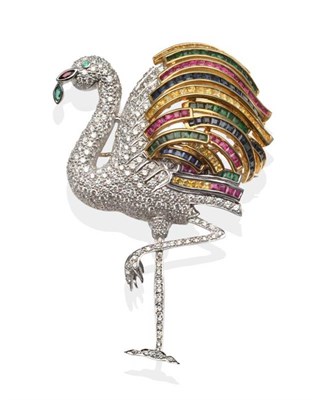 Lot 282 - A Multi-Gemstone Flamingo Brooch, set with yellow and blue sapphires, emeralds, rubies and...