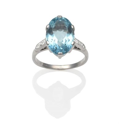 Lot 288 - An Aquamarine and Diamond Ring, an oval cut aquamarine in a white claw setting, to eight-cut...