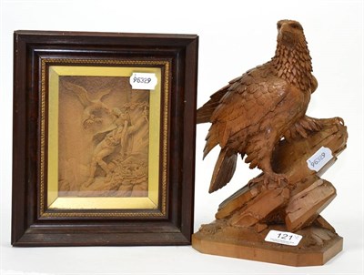 Lot 121 - Black Forest, carved wood figure of an eagle, and box-framed diorama of an eagle attacking a...