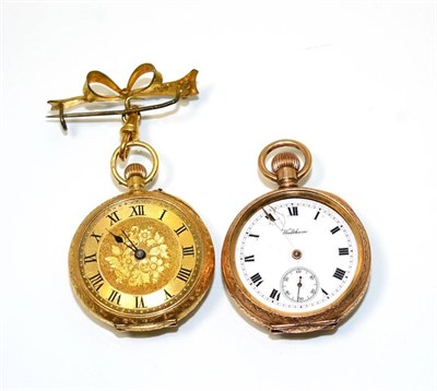 Lot 134 - A lady's 18 carat gold fob watch with applied gilt metal bow brooch and a lady's plated Waltham fob