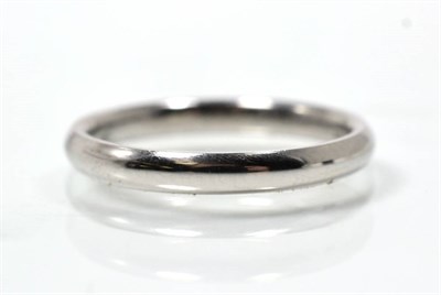 Lot 156 - A platinum band ring, finger size K1/2