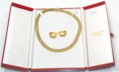 Lot 174 - A diamond necklace and clip earring suite, a two colour brick link chain, the front with a...