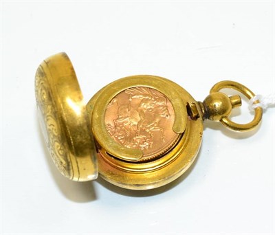 Lot 178 - A George V 1911 sovereign in a gilt metal sovereign holder
