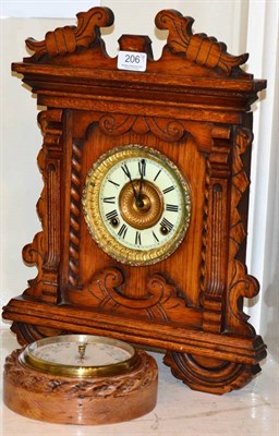 Lot 206 - An Ansonia clock and a barometer in a rope twist frame