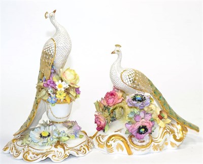 Lot 212 - A Royal Crown Derby model of a peacock atop a floral encrusted urn, signed P. Kinnerley & J. Plant