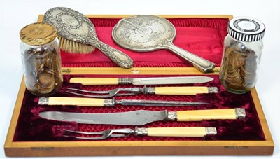 Lot 230 - A Victorian ivory handled carving set, cased; a silver backed brush; a silver backed mirror;...