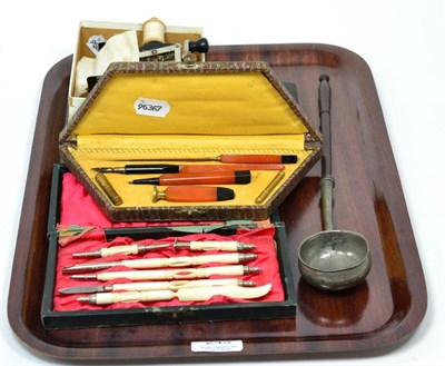 Lot 243 - Mullers hand sewing machine, writing sets, pewter toddy, Eastern cigarette case