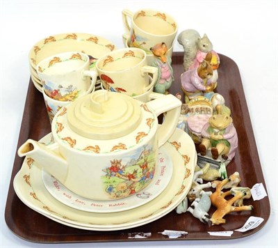 Lot 259 - Doulton Bunnykins set of six cups and saucers, teapot and two plates; another plate; five...