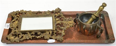 Lot 269 - A cast brass rococo style frame, stamped to reverse; an Arts and Crafts copper rectangular...